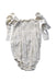 A Ivory Sleeveless Rompers from Nothing Fits But in size 3-6M for girl. (Back View)