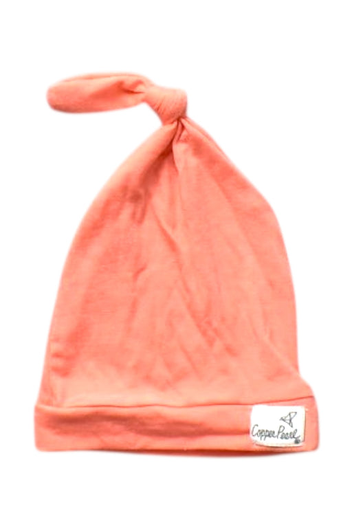 A Peach Beanies from Copper Pearl in size Newborn for girl. (Front View)