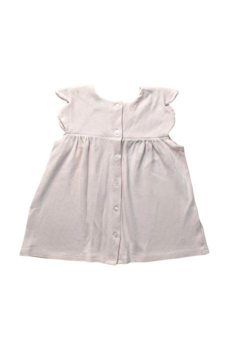 A Ivory Sleeveless Dresses from Bella Bliss in size 6T for girl. (Back View)