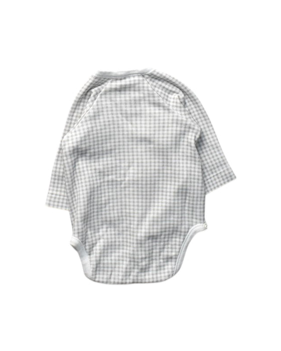 A White Long Sleeve Bodysuits from Cambrass in size Newborn for boy. (Back View)