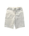 A White Shorts from Jacadi in size 5T for boy. (Front View)