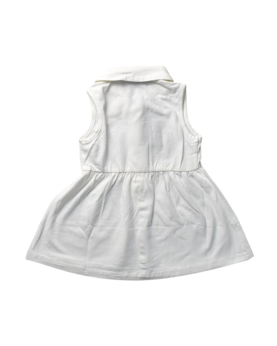 A White Sleeveless Dresses from Mothercot in size 3-6M for girl. (Back View)