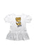 A White Short Sleeve Dresses from Moschino in size 4T for girl. (Front View)