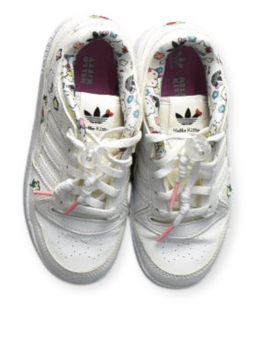 A White Sneakers from Adidas in size 6T for girl. (Back View)
