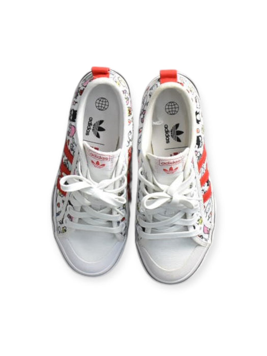 A Red Sneakers from Adidas in size 12Y for neutral. (Front View)