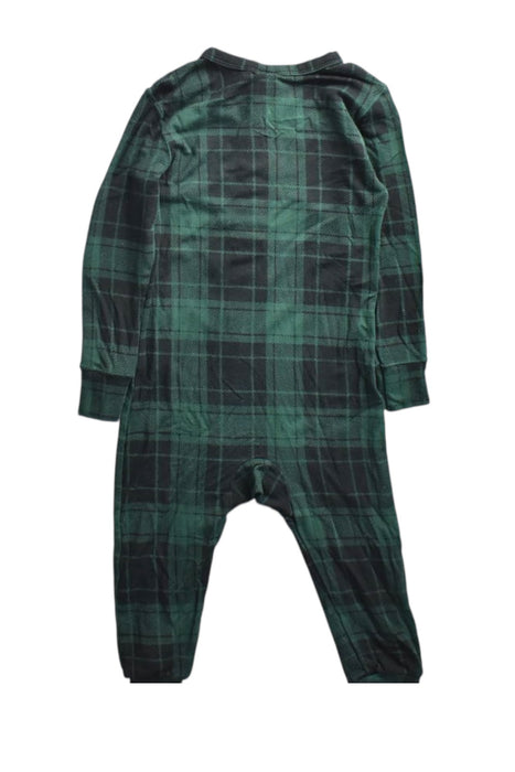 A Green Onesies from Skims in size 12-18M for neutral. (Back View)