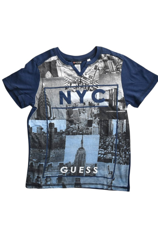 A Blue Short Sleeve T Shirts from Guess in size 7Y for girl. (Front View)