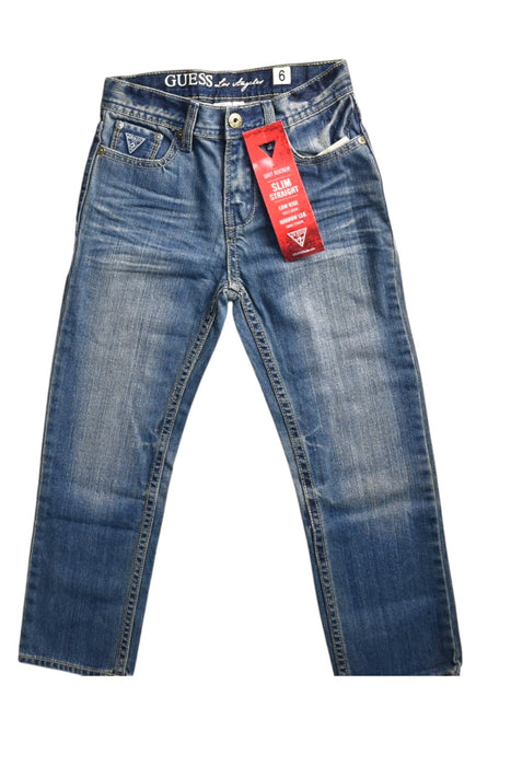 A Blue Jeans from Guess in size 6T for girl. (Front View)