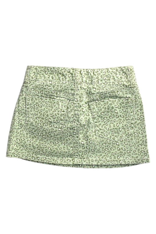 A Green Short Skirts from Guess in size 7Y for girl. (Front View)