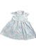 A White Short Sleeve Dresses from Le Petit Society in size 6-12M for girl. (Front View)