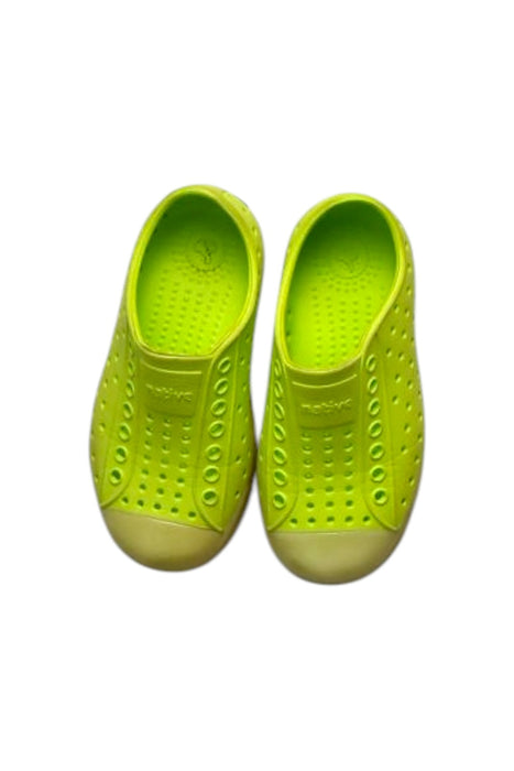 A Yellow Slip Ons from Native Shoes in size 4T for neutral. (Back View)