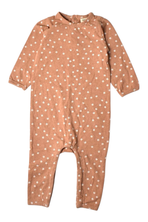 A Peach Long Sleeve Bodysuits from Nature Baby in size 6-12M for girl. (Front View)