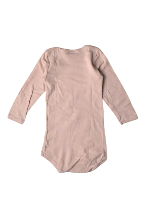 A Peach Long Sleeve Bodysuits from Petit Bateau in size 6-12M for girl. (Back View)