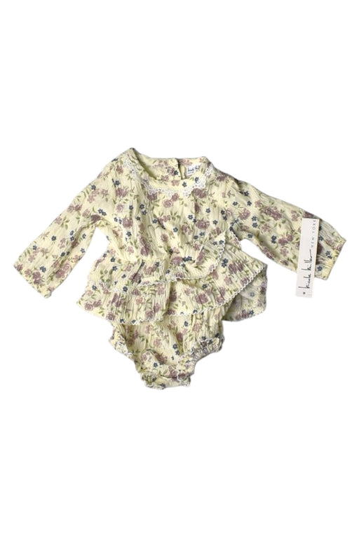 A Ivory Long Sleeve Rompers from Nicole Miller in size 6-12M for girl. (Front View)