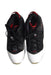 A Black Sneakers from Air Jordan in size 14Y for boy. (Back View)