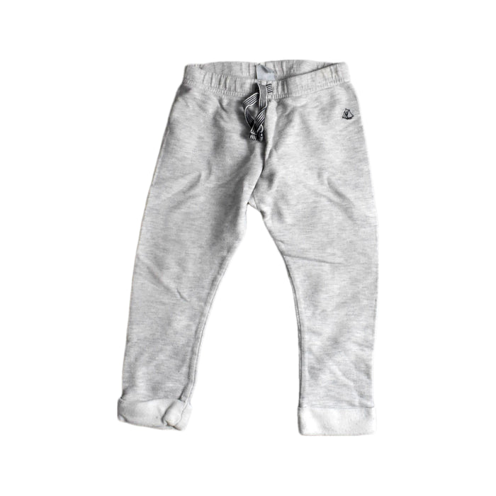A Grey Sweatpants from Petit Bateau in size 2T for girl. (Front View)