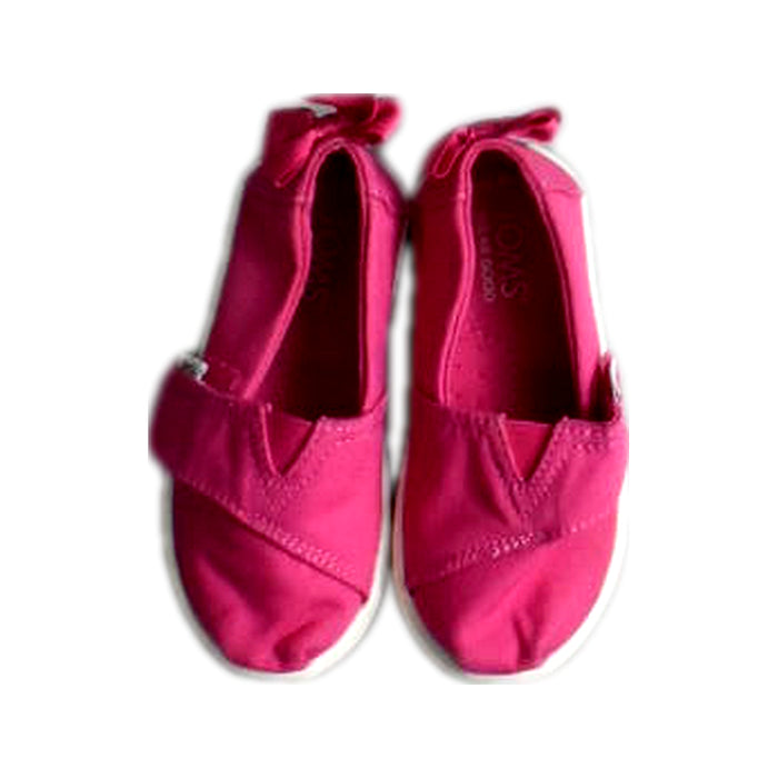 A Pink Slip Ons from Toms in size 18-24M for girl. (Back View)