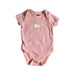 A Pink Short Sleeve Bodysuits from DKNY in size 3-6M for girl. (Front View)