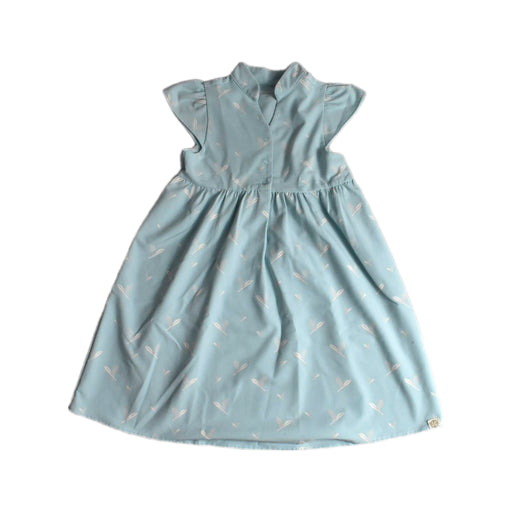 A Blue Short Sleeve Dresses from Le Petit Society in size 6T for girl. (Front View)