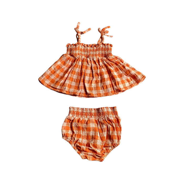 A Orange Shorts Sets from Seed in size 6-12M for girl. (Back View)