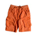A Orange Shorts from Mothercare in size 2T for boy. (Front View)