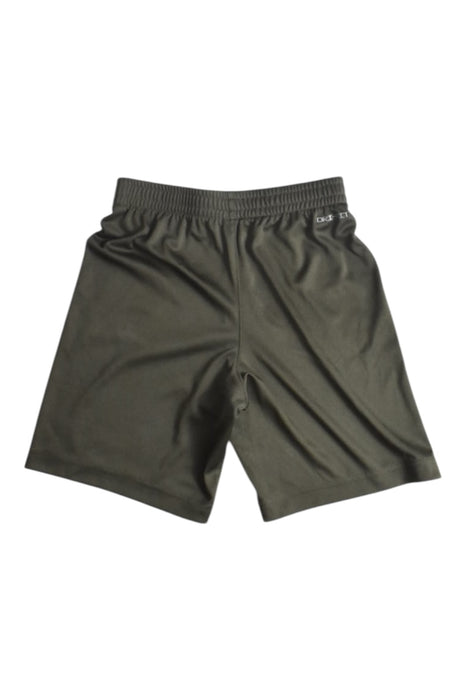 A Green Shorts from Nike in size 7Y for boy. (Back View)
