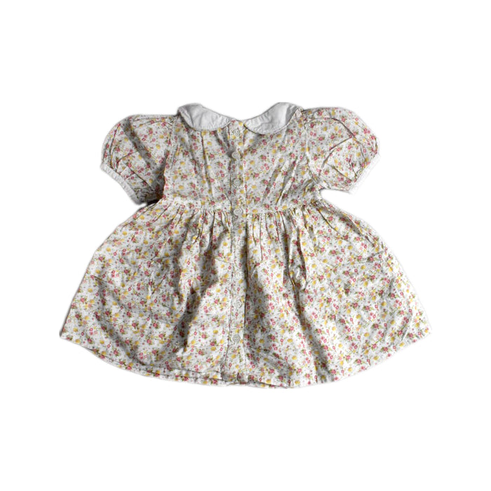 A White Short Sleeve Dresses from bloomB in size 3-6M for girl. (Back View)