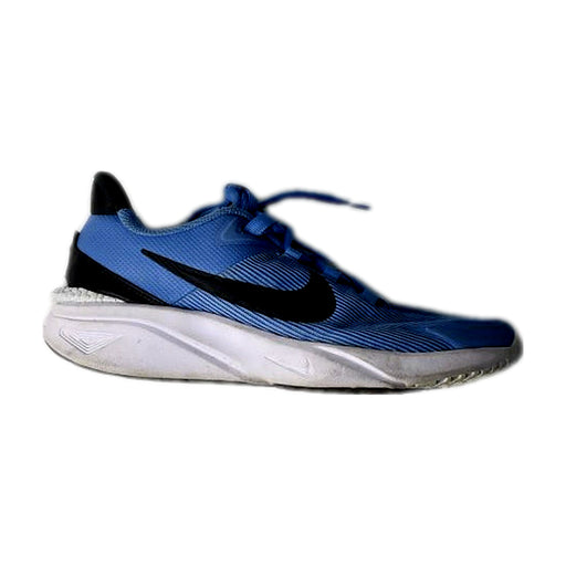 A Blue Sneakers from Nike in size 12Y for boy. (Front View)