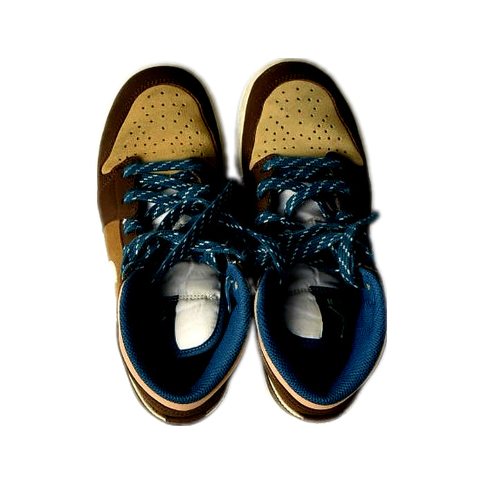 A Brown Sneakers from Nike in size 11Y for boy. (Back View)