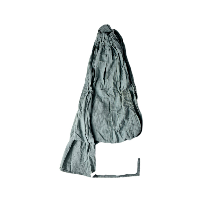 A Green Swaddles from Moby in size O/S for neutral. (Front View)