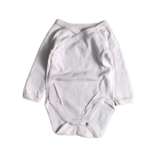 A White Long Sleeve Bodysuits from Petit Bateau in size 0-3M for girl. (Front View)