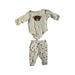 A White Pants Sets from Mori in size 6-12M for girl. (Front View)