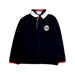 A Navy Long Sleeve Polos from Jacadi in size 4T for boy. (Front View)