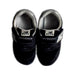 A Black Sneakers from New Balance in size 4T for neutral. (Back View)