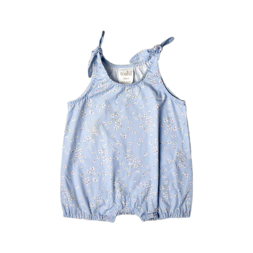 A Blue Sleeveless Rompers from Toshi in size 6-12M for girl. (Front View)