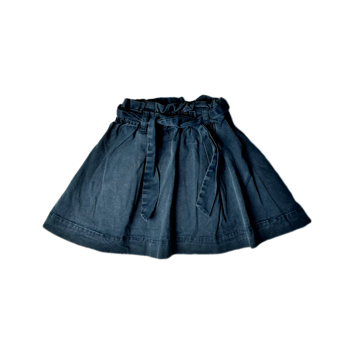 A Navy Short Skirts from Bonpoint in size 6T for girl. (Front View)