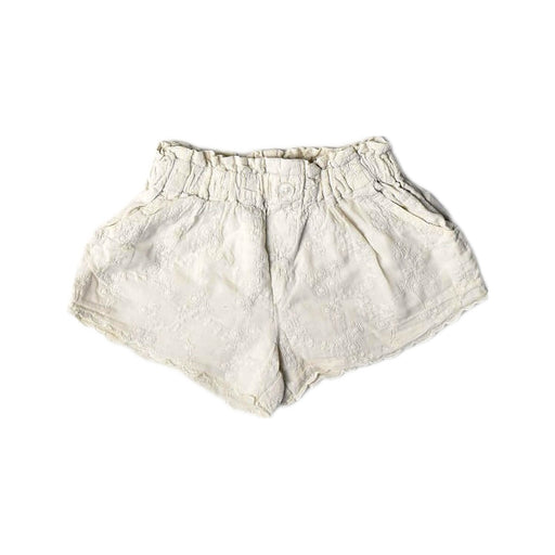 A White Shorts from Gingersnaps in size 3-6M for girl. (Front View)