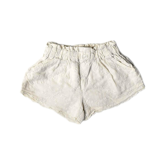A White Shorts from Gingersnaps in size 3-6M for girl. (Front View)