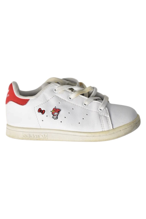 A White Sneakers from Adidas in size 4T for girl. (Front View)