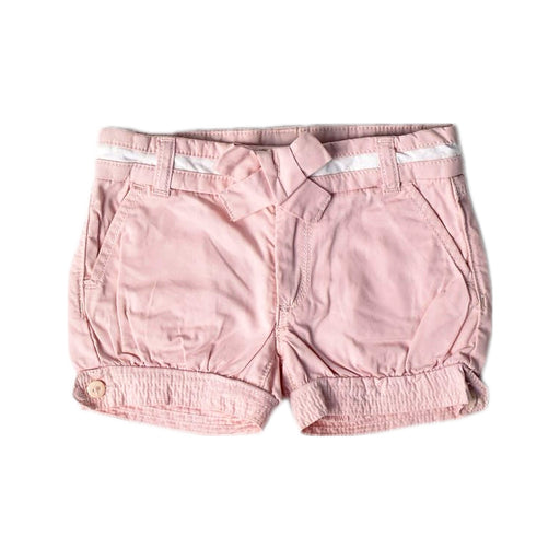 A Pink Shorts from Guess in size 12-18M for girl. (Front View)