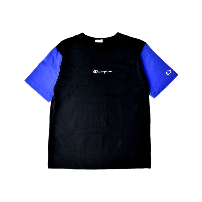 A Black Short Sleeve T Shirts from Champion in size 10Y for boy. (Front View)