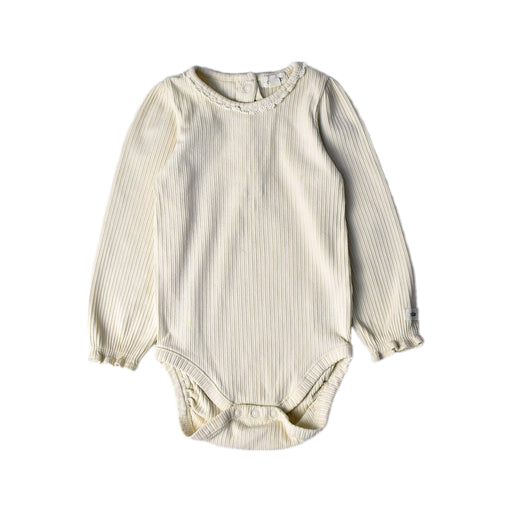 A Ivory Long Sleeve Bodysuits from Newbie in size 12-18M for girl. (Front View)