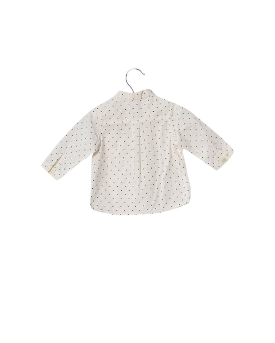 A White Long Sleeve Tops from Petit Bateau in size 6-12M for boy. (Front View)