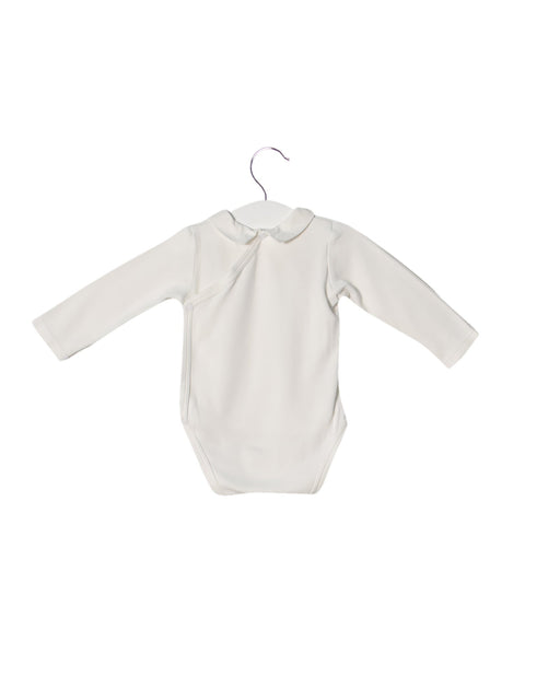 A White Long Sleeve Bodysuits from Jacadi in size 3-6M for girl. (Front View)