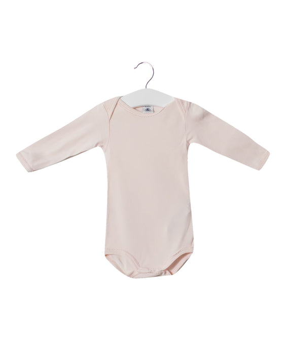 A Pink Long Sleeve Bodysuits from Petit Bateau in size 3-6M for girl. (Front View)