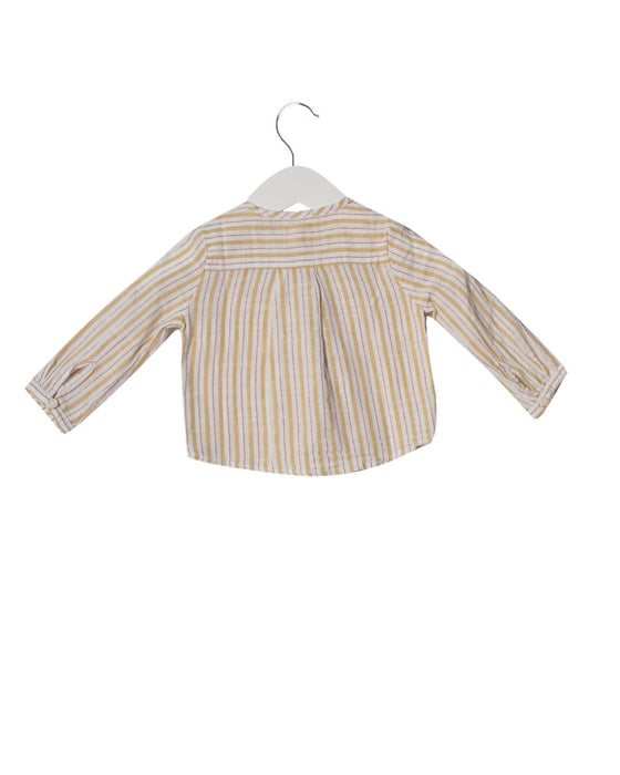 A White Shirts from Gocco in size 3-6M for boy. (Back View)