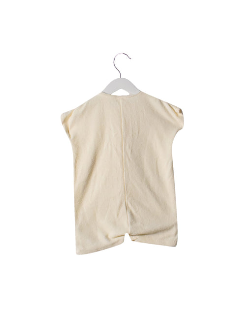 A Ivory Sleeveless Rompers from Zulu & Zephyr in size 2T for girl. (Front View)