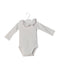 A White Long Sleeve Bodysuits from Jacadi in size 3-6M for girl. (Front View)
