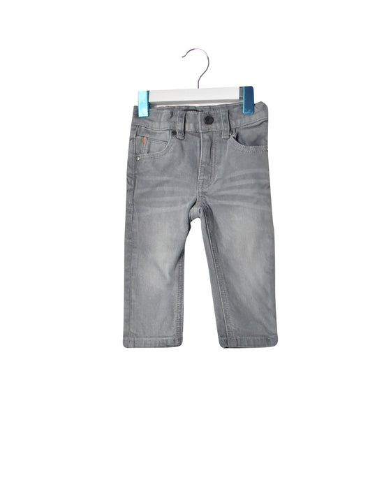A Grey Jeans from Hugo Boss in size 6-12M for girl. (Front View)
