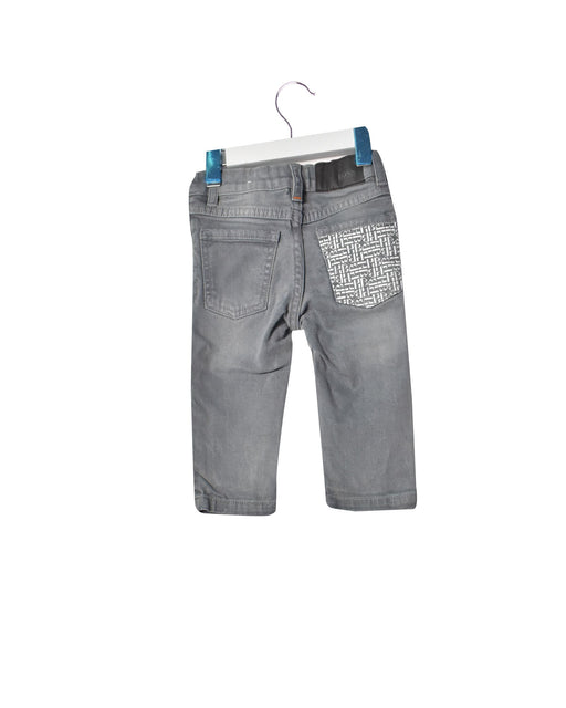 A Grey Jeans from Hugo Boss in size 6-12M for girl. (Front View)